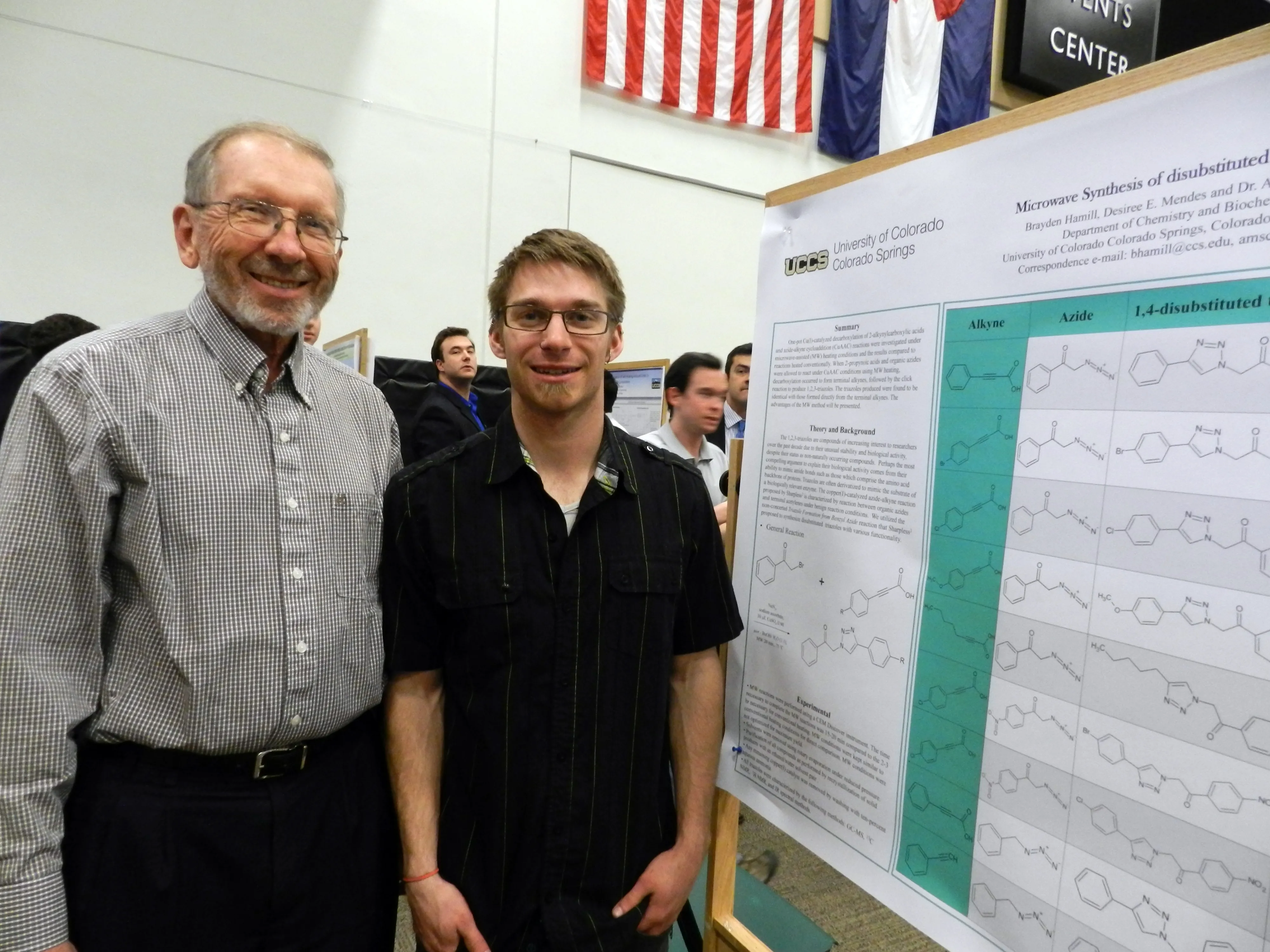 Al Schoffstall with student and poster